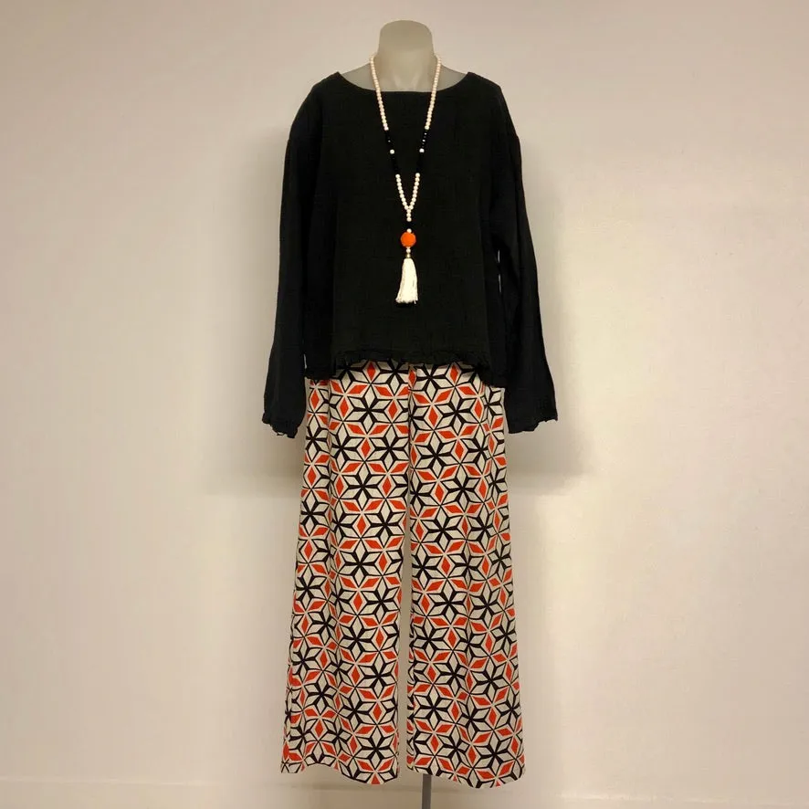 Surge Tangerine   Black Geometric Linen Wide Leg Trousers