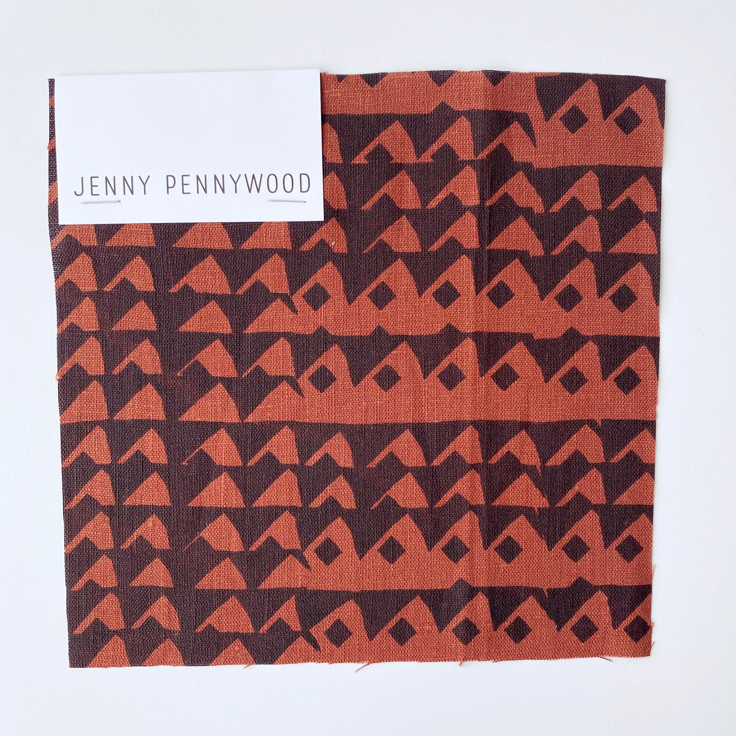 Triangles in Midnight on Burnt Sienna - 100% linen - FABRIC BY THE YARD